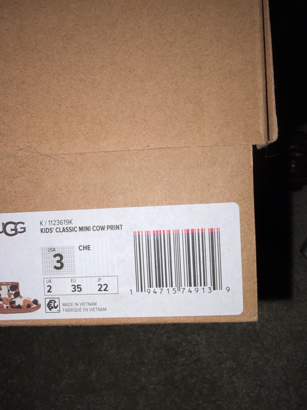 UGG Cow Print Mini Boots - Picture 4 of 4